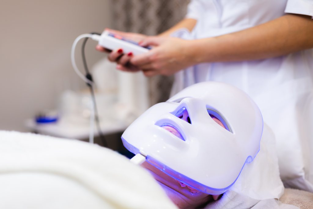LED light therapy facial treatment in spa